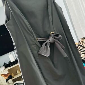 Chic Black Sleeveless Dress with Bow Detail